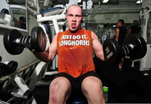 Man doing some fitness training in gym